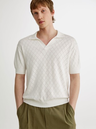 вязаное поло с коротким рукавом фотография