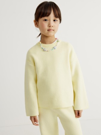 вязаный джемпер в полоску для девочек фотография