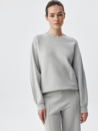 вязаный джемпер жаккардовой вязки фотография