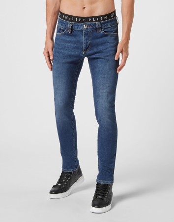 джинсы зауженные  фотография