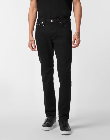 джинсы зауженные  фотография