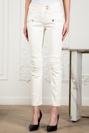 джинсы  - женская одежда на клепках 