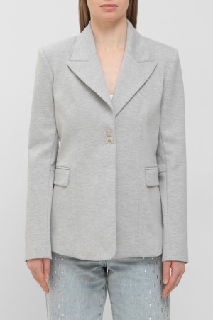 пиджак  - женская одежда на клепках 