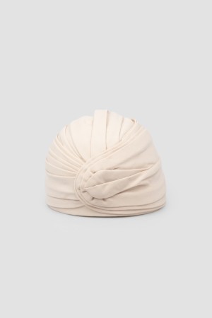 шапка-тюрбан  - женские аксессуары кремовые 