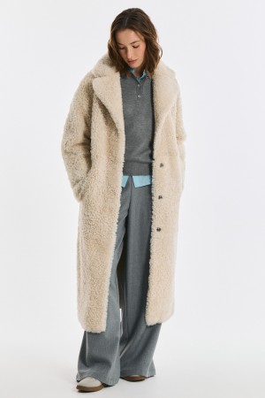 дубленка из овчины с поясом фотография