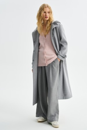 пальто из шерсти с капюшоном фотография