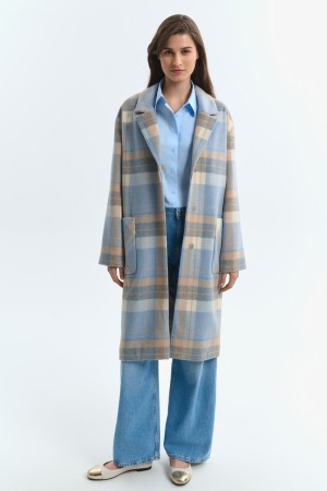 пальто в клетку фотография