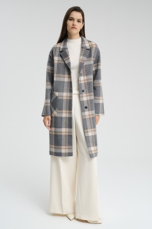 пальто в клетку фотография