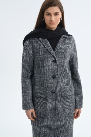 пальто в клетку фотография