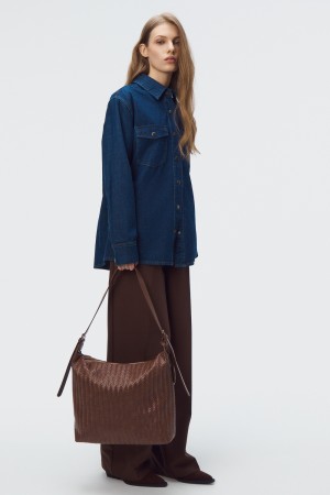 плетеная сумка из искусственной кожи фотография
