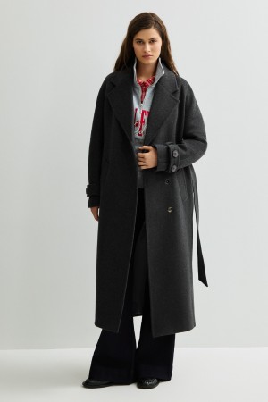 шерстяное пальто с поясом фотография