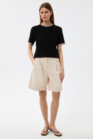 шорты с защипами фотография