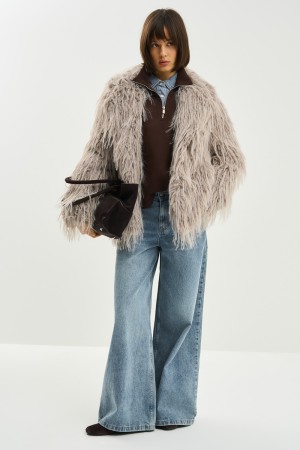 шуба из искусственного меха с поясом фотография