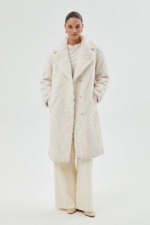 шуба из овечьей шерсти фотография