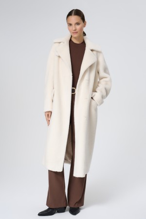 шуба из овечьей шерсти фотография