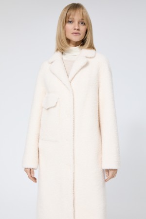 шуба из овечьей шерсти фотография