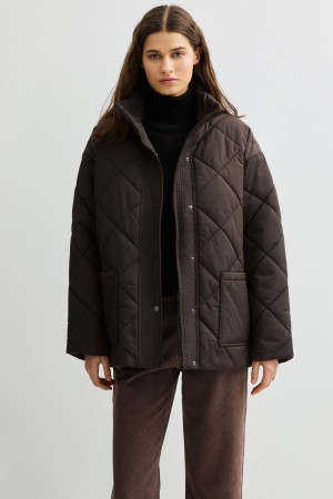 стеганая куртка с поясом фотография