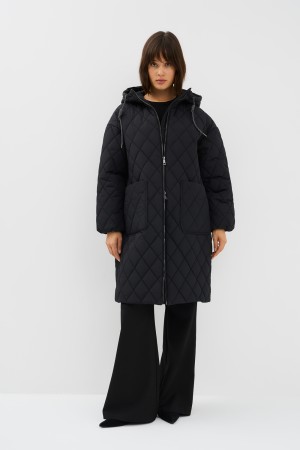 стеганое пальто с капюшоном фотография