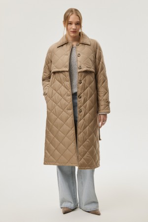 стеганое пальто с поясом фотография