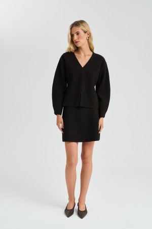 трикотажная мини-юбка фотография