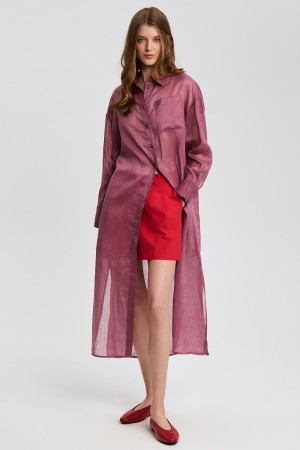 удлиненная блузка изо льна фотография