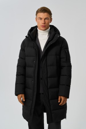 удлиненная зимняя куртка с капюшоном фотография