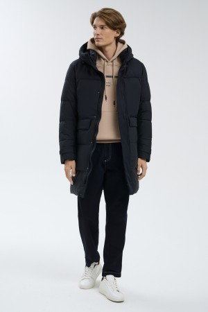 удлиненная зимняя куртка фотография