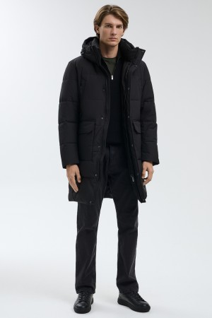 удлиненная зимняя куртка фотография