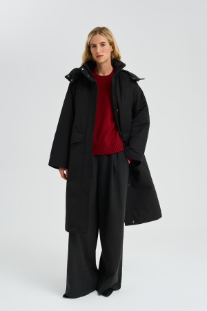 утепленное пальто с поясом фотография