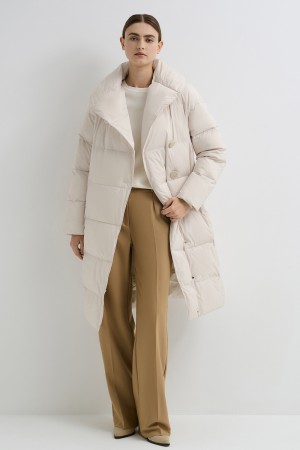 зимнее стеганое пальто фотография