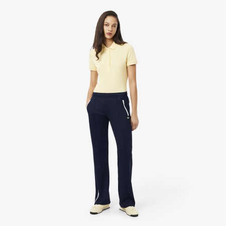 женские спортивные брюки  с расклешенным кроем - одежда lacoste 